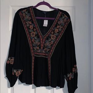 Black flowy blouse with flower embroidery